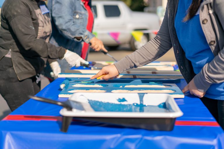 CLOVIS, CALIFORNIA, UNITED STATES (11/08/2018) - Painting playhouse pieces. Work performed by volunteers.